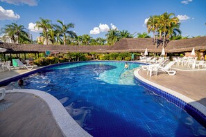 4 indoor pools, open 7:00 AM to 10:00 PM, pool umbrellas