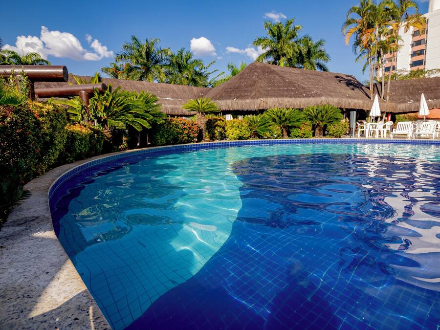 4 indoor pools, open 7:00 AM to 10:00 PM, pool umbrellas