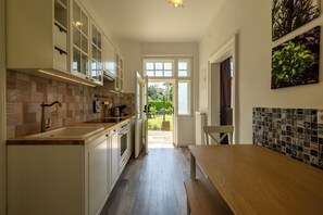 Private kitchen - Albizia-Apartments (Baden)