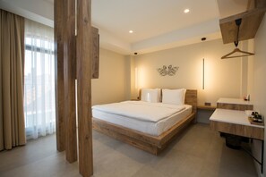 豪華客房 | 埃及棉床單、高級寢具、迷你吧贈品、隔音