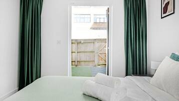 2 bedrooms, desk, iron/ironing board, travel cot