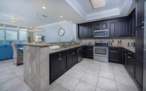 Condo, 3 Bedrooms | Private kitchen | Fridge, oven, coffee/tea maker