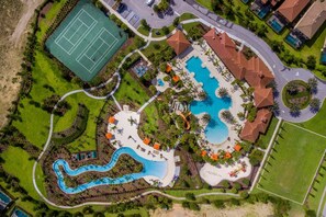 Enjoy resort amenities like tennis courts, multiple pools, a play area, and a beautifully landscaped garden.