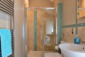 Bathtub, hair dryer, towels
