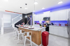 Fridge, microwave, oven, stovetop - Thematic House with pool and game room at Resort! (Davenport)
