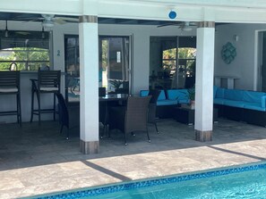Outdoor dining - Private updated house with heated pool! Canal frontage for boats and gulf access (Cape Coral)