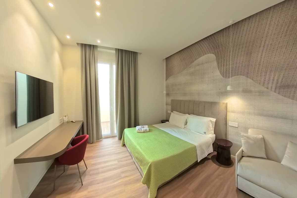 Chambre Deluxe double ou avec lits jumeaux | Minibar, bureau, accès au Wi-Fi (inclus), literie fournie