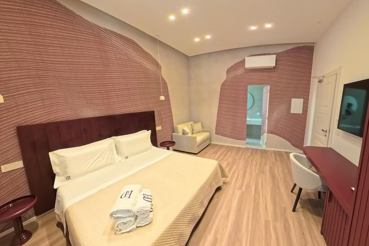 Chambre Confort double ou avec lits jumeaux | Minibar, bureau, accès au Wi-Fi (inclus), literie fournie