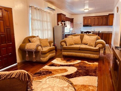 Upper flat in Eccles Home, 3 bedrooms, sleeps 6, AC, Hot Water