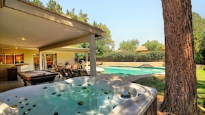 A backyard with a hot tub, a pool, and a covered patio area. - Listing Description has Discounts! Kierland Home w/Pool & Hot Tub & Nearby Park! (Scottsdale)
