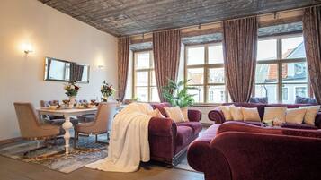 Superior Apartment | Living area | 55-cm Smart TV with cable channels