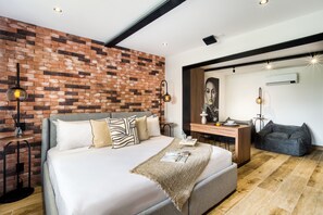 New York Style Studio | Down comforters, individually decorated, individually furnished