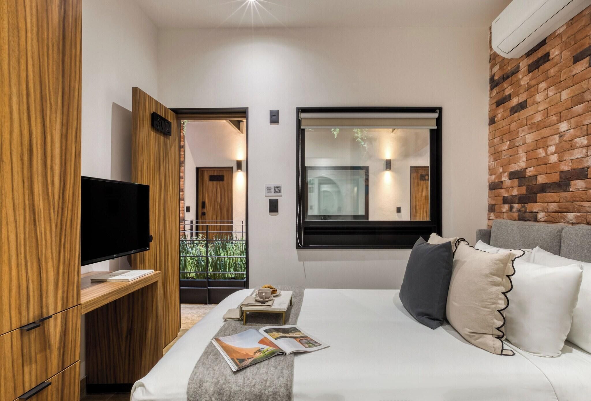 Down comforters, blackout drapes, WiFi (free), individually decorated