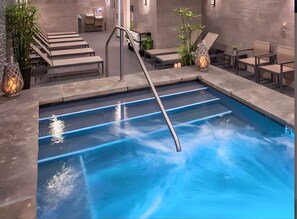 Relax by the pool with a refreshing swim or lounge on a comfortable chair.