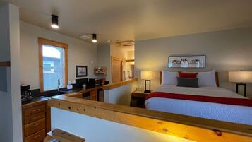 Tabla de planchar con plancha, wifi y ropa de cama