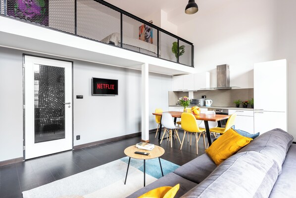 Luxury Apartment | Living area | 50-inch plasma TV with cable channels - Luxury family apartment on Krizikova st (Prague)