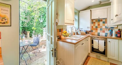 Escape to this charming holiday cottage nestled amidst picturesque landscapes.