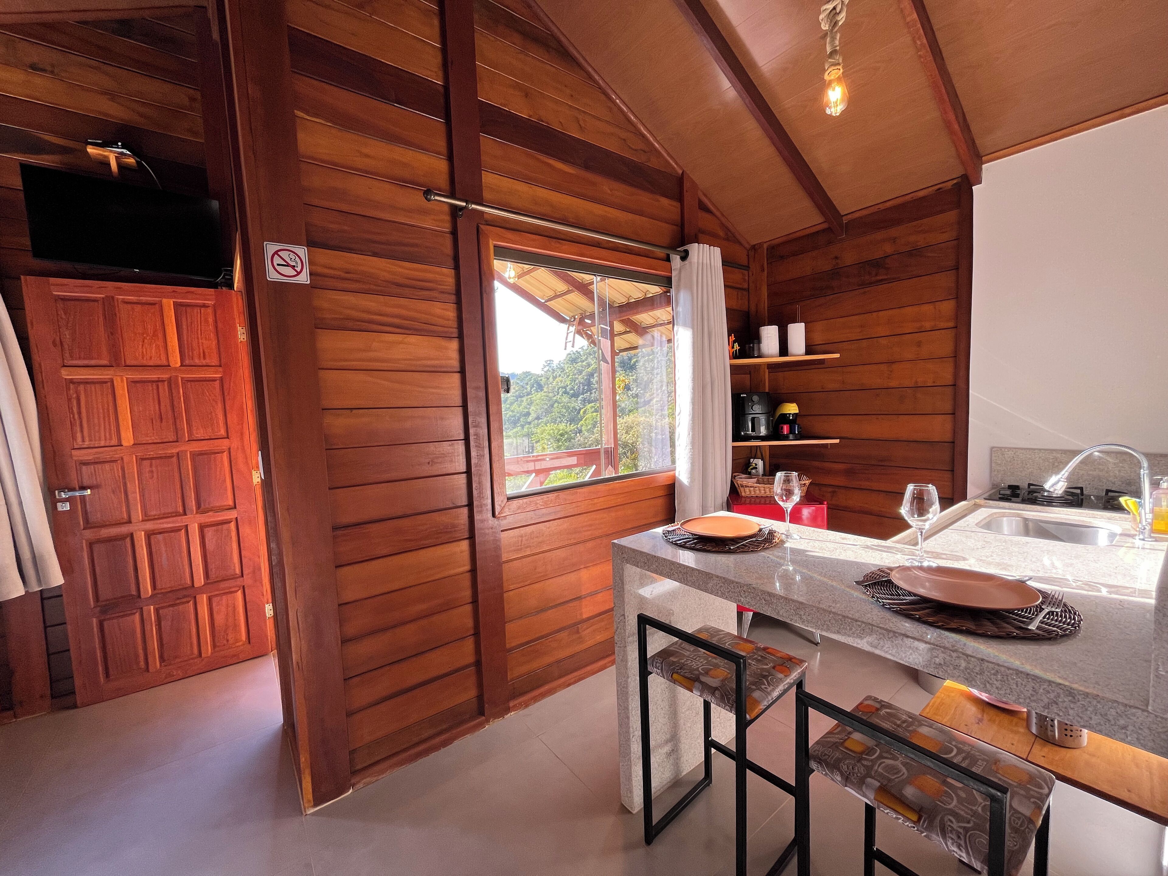 Cabin | Private kitchen | Full-size fridge, microwave, oven, coffee/tea maker