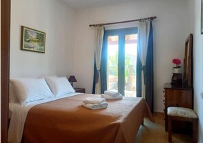 Pillow-top beds, laptop workspace, blackout curtains, iron/ironing board