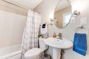 Hair dryer, towels, soap, shampoo