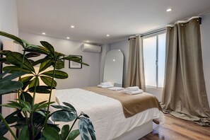 1 habitación, tabla de planchar con plancha, wifi gratis y ropa de cama 