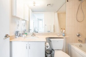 Hair dryer, towels, soap, shampoo