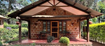Authentic yet pristine, The Watering Hole is a quiet B&B just outside of Moshi!