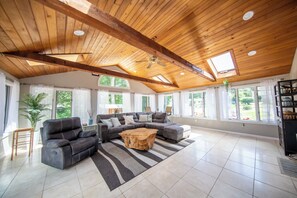 Smart TV, fireplace, foosball, books