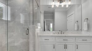Bathtub, hair dryer, towels