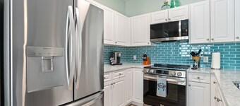 ON Flagler Avenue! Dog Friendly with Balcony and Parking. Walk to the Beach!