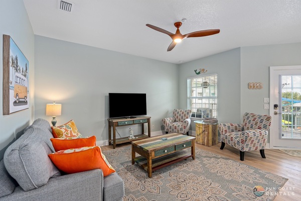 Inviting Living Room with Ample Seating and 55" Smart TV