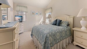 A bedroom with a bed, dresser, TV, and ceiling fan. - 4305 Park Road, Sea Isle City (Sea Isle City)