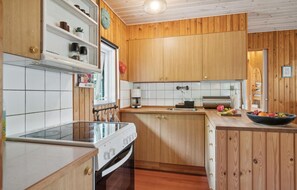 Fridge, coffee/tea maker, cookware/dishes/utensils