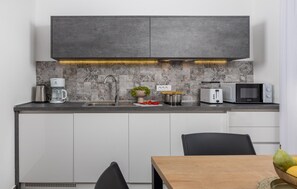 Fridge, microwave, dishwasher, coffee/tea maker