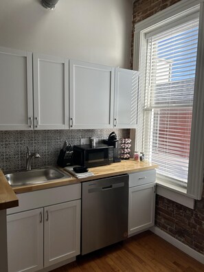 Fridge, microwave, dishwasher, coffee/tea maker