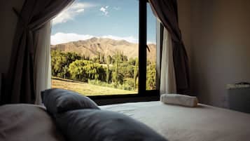 Deluxe Cottage, 1 Bedroom, Mountain View | 1 bedroom, individually decorated, laptop workspace, free WiFi