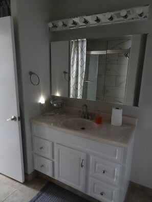 Bathtub, hair dryer, towels