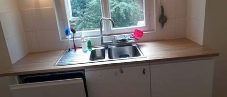 Fridge, dishwasher, electric kettle, cookware/dishes/utensils