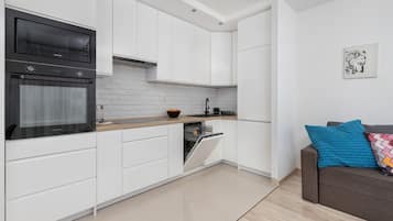 Apartment, 1 Bedroom, Balcony | Private kitchen | Microwave, dishwasher, cookware/dishes/utensils