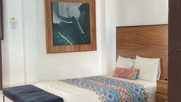 Habitación doble familiar | Ropa de cama