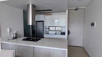 Family Apartment | Private kitchen | Full-sized fridge, microwave, oven, stovetop