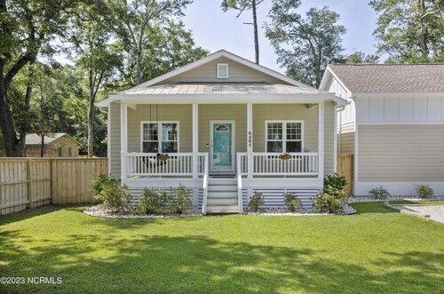 Only TWO MILES to the beach! Custom bungalow. Fenced-in yard!
