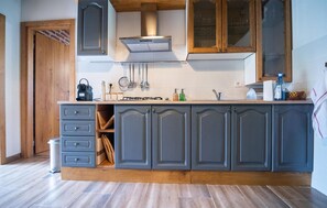 Fridge, stovetop, coffee/tea maker, cookware/dishes/utensils