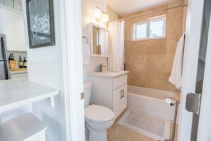 Hair dryer, towels, soap, shampoo