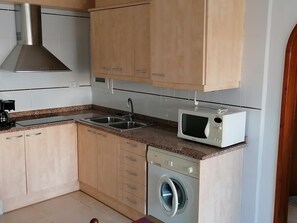Fridge, microwave, coffee/tea maker, toaster