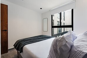 1 slaapkamer, een strijkplank/strijkijzer, wifi, beddengoed