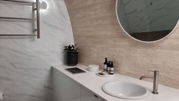 Shower, hair dryer, towels, soap