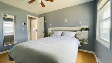 1 bedroom, desk, iron/ironing board, travel crib