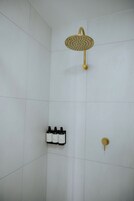Deluxe Queen Room, 1 Queen Bed | Bathroom | Shower, hair dryer, towels, soap