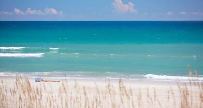 Private cottage at the end of the road with hot tub, swim mat, kayaks, and a your private dock, 3 miles to the beach.